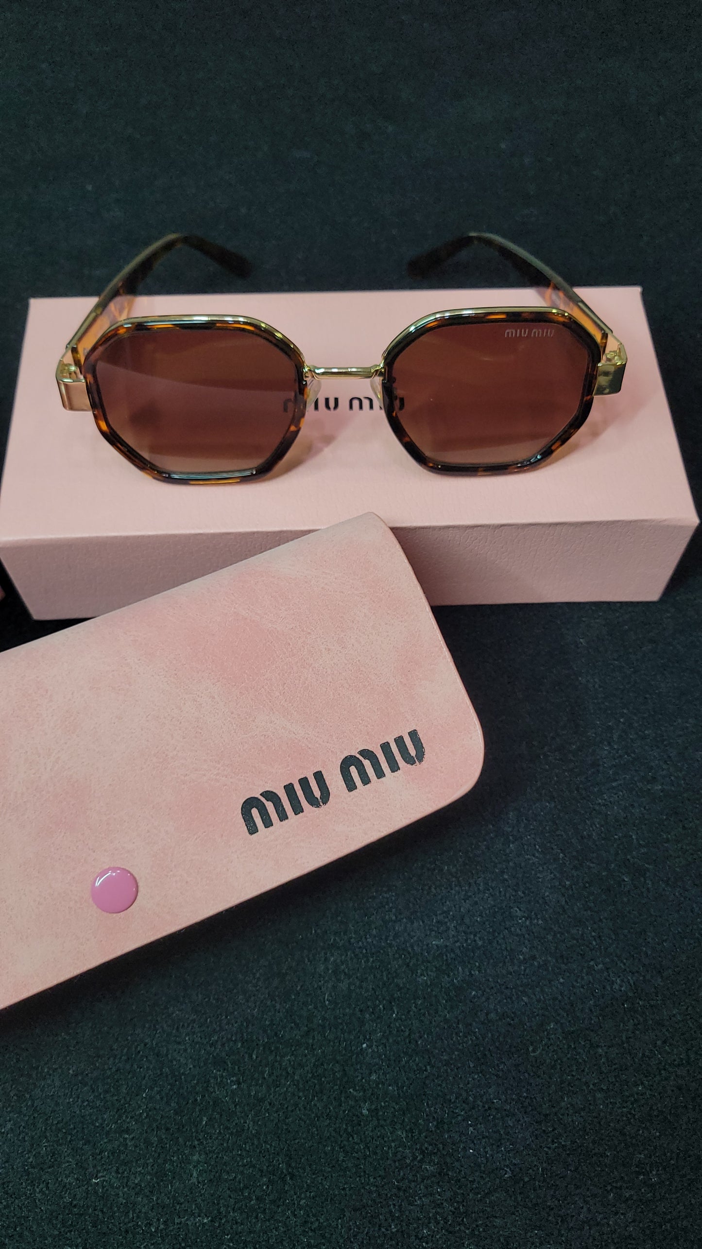 MiuMiu Sunglasses