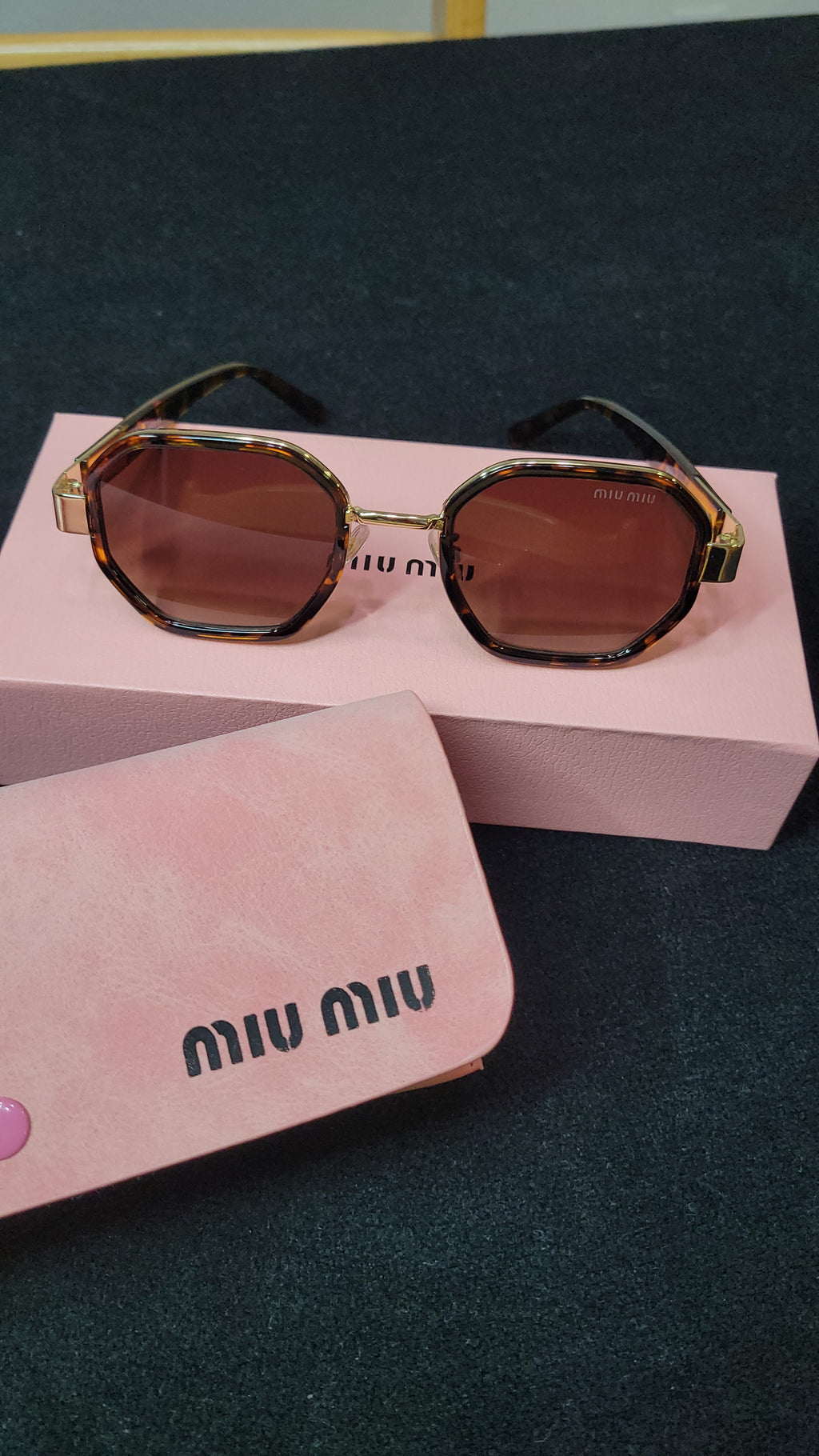 MiuMiu Sunglasses