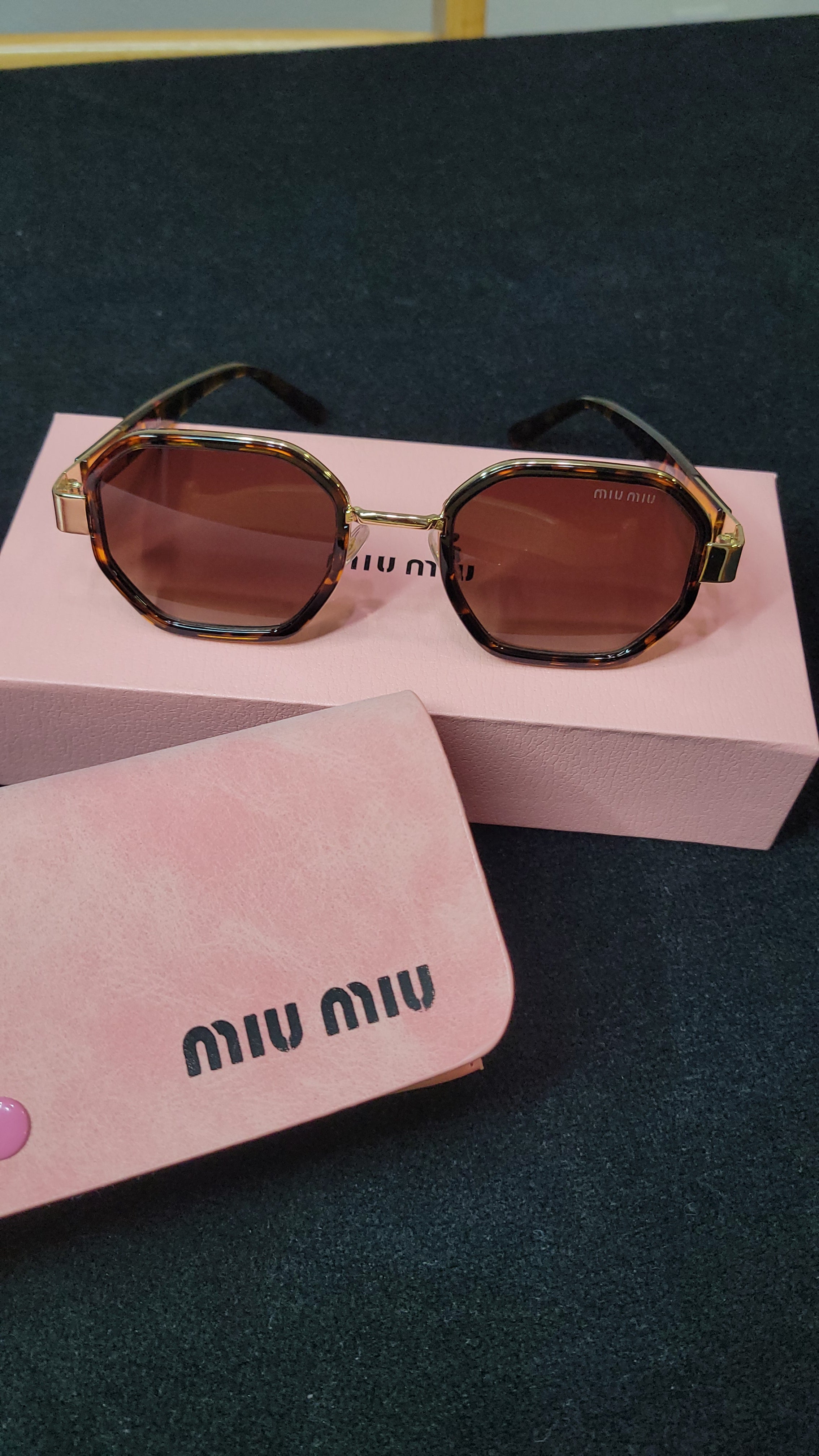 MiuMiu Sunglasses